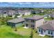 Aerial view of homes with spacious lawns at 10611 Ladybug Cv, Parrish, FL 34219
