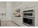 Gourmet kitchen featuring built-in stainless steel appliances and ample counter space at 12139 Cranston Way, Bradenton, FL 34211