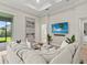 Comfortable living room featuring stylish decor, a large sofa, and a view of the outdoors at 12139 Cranston Way, Bradenton, FL 34211