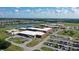 Aerial view of the new school with ample parking and green spaces at 12139 Cranston Way, Bradenton, FL 34211