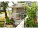 Cozy back porch with white railings overlooking the backyard, offering a private outdoor space at 1505 43Rd Avenue W Dr, Palmetto, FL 34221
