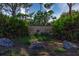 Entrance to Emerson Point, featuring a stone sign, cactus, and lush landscaping at 1505 43Rd Avenue W Dr, Palmetto, FL 34221