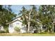 Two-story home with classic architecture and well-manicured landscaping, showcasing its curb appeal at 1505 43Rd Avenue W Dr, Palmetto, FL 34221