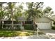 Charming two-story home featuring a screened porch, attached two-car garage and beautifully landscaped yard at 1505 43Rd Avenue W Dr, Palmetto, FL 34221