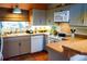 Neutral kitchen featuring updated cabinets, modern appliances, and ample counter space at 1505 43Rd Avenue W Dr, Palmetto, FL 34221