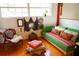 Eclectic living room with vibrant colors, stylish furnishings, and unique decor at 1505 43Rd Avenue W Dr, Palmetto, FL 34221