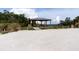 Outdoor picnic area with a sheltered pavilion, picnic tables, and views of the water, perfect for gatherings at 1505 43Rd Avenue W Dr, Palmetto, FL 34221