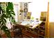 Cozy studio space with hardwood floors, a craft table with supplies, and storage shelves at 1505 43Rd Avenue W Dr, Palmetto, FL 34221