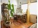 Bright studio space featuring hardwood floors, a large worktable, and ample natural light at 1505 43Rd Avenue W Dr, Palmetto, FL 34221