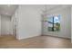 Living room with a chandelier and natural light at 1605 Landfall Dr, Nokomis, FL 34275
