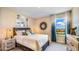 Serene bedroom with natural light, stylish decor, and a comfortable bed at 17904 Tavernside Trl, Bradenton, FL 34211