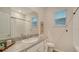 Bright bathroom featuring updated fixtures and framed nautical themed art at 18324 Cropside Trl, Lakewood Ranch, FL 34211