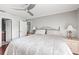 Bright bedroom with hardwood floors, ceiling fan, and generous closet space at 2204 67Th W St, Bradenton, FL 34209