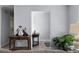 Entryway leading to a bright living room with neutral walls and floors at 2204 67Th W St, Bradenton, FL 34209