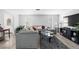 Bright living room with modern decor, comfortable seating, and ample natural light at 2204 67Th W St, Bradenton, FL 34209