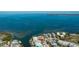 Waterfront home with dock, lush landscaping, and breathtaking ocean views at 236 S Harbor Dr, Holmes Beach, FL 34217