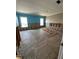 Spacious living room with natural light, ready to be remodeled to your exact specifications and style at 236 S Harbor Dr, Holmes Beach, FL 34217