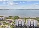 Panoramic aerial view showing condos near ocean with private dock and lush foliage at 2825 Terra Ceia Bay Blvd # 1804, Palmetto, FL 34221