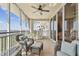Spacious balcony features comfortable seating, a ceiling fan, and scenic neighborhood views at 2825 Terra Ceia Bay Blvd # 1804, Palmetto, FL 34221