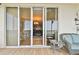 Inviting balcony with sliding glass doors offers seamless indoor/outdoor living and neighborhood views at 2825 Terra Ceia Bay Blvd # 1804, Palmetto, FL 34221