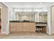 Large bathroom featuring a double vanity, granite countertops, wood cabinets, and tiled floors at 2825 Terra Ceia Bay Blvd # 1804, Palmetto, FL 34221