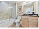 Bathroom featuring a shower and tub combo with wood-look flooring at 2825 Terra Ceia Bay Blvd # 1804, Palmetto, FL 34221