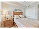 Comfortable bedroom features modern decor and soft, inviting bedding and natural light at 2825 Terra Ceia Bay Blvd # 1804, Palmetto, FL 34221