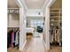 Hallway between two closets featuring the main bedroom with plantation shutters in the background at 2825 Terra Ceia Bay Blvd # 1804, Palmetto, FL 34221