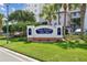 The Bay Club community sign surrounded by lush green lawn and landscaping at 2825 Terra Ceia Bay Blvd # 1804, Palmetto, FL 34221