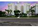 Elegant condo building featuring manicured landscaping and well-lit exterior at 2825 Terra Ceia Bay Blvd # 1804, Palmetto, FL 34221