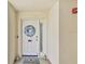 Charming front door with wreath, welcome mat, and unit number; enhances curb appeal at 2825 Terra Ceia Bay Blvd # 1804, Palmetto, FL 34221