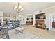Open floor plan living room with fireplace and views of the kitchen and dining areas at 2825 Terra Ceia Bay Blvd # 1804, Palmetto, FL 34221