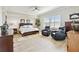 Spacious main bedroom with wood floors, plantation shutters, and stylish furnishings at 2825 Terra Ceia Bay Blvd # 1804, Palmetto, FL 34221