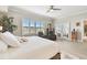Cozy main bedroom with plenty of natural light, plantation shutters, and stylish decor at 2825 Terra Ceia Bay Blvd # 1804, Palmetto, FL 34221