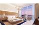Serene main bedroom with floor-to-ceiling windows and tasteful decor at 290 Cocoanut Ave # 8B, Sarasota, FL 34236