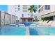 Upscale pool area with cabanas and lounge chairs, perfect for relaxation at 290 Cocoanut Ave # 8B, Sarasota, FL 34236