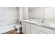 Bright bathroom featuring double vanity, large mirror and a shower and tub combination at 3219 Bitterroot Ln, Lakewood Ranch, FL 34211