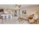 Inviting living room featuring an open floor plan, tile flooring, and plenty of natural light at 3278 Rock Sound St, Bradenton, FL 34208