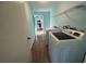 Functional laundry room featuring modern washer and dryer at 3339 Duar Ter, North Port, FL 34291