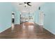 Bright living room with wood floors, stainless appliances, and an open floor plan for easy entertaining at 3339 Duar Ter, North Port, FL 34291