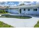 Relax poolside on the patio of this lovely home at 3339 Duar Ter, North Port, FL 34291