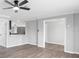 Open-concept living room with hard surface flooring and neutral paint provides generous space at 3631 Palm Dr, Punta Gorda, FL 33950