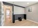 Home theater with a large projector screen, built-in speakers, and hardwood floors at 3634 Torrey Pines Way Way, Sarasota, FL 34238