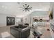 Spacious, modern living room flows into the dining and kitchen areas, perfect for entertaining at 3634 Torrey Pines Way Way, Sarasota, FL 34238