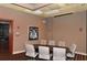 Conference room offering seating for six, neutral wall color, and mounted picture for a professional setting at 3634 Torrey Pines Way Way, Sarasota, FL 34238