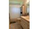 Functional bathroom with a shower, toilet, vanity, and storage options, maximizing space and convenience at 4149 Prudence Dr, Sarasota, FL 34235