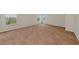 Spacious bedroom featuring neutral carpet, bright walls, and multiple windows allowing natural light in at 4307 70Th E Ave, Ellenton, FL 34222