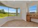 Bright breakfast nook featuring an exterior view, tile flooring, and a built-in desk at 4307 70Th E Ave, Ellenton, FL 34222