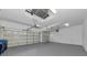 Spacious three-car garage with ample room for vehicles and storage at 4307 70Th E Ave, Ellenton, FL 34222