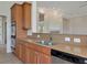 Kitchen counter and stainless steel double oven with granite counters at 4307 70Th E Ave, Ellenton, FL 34222